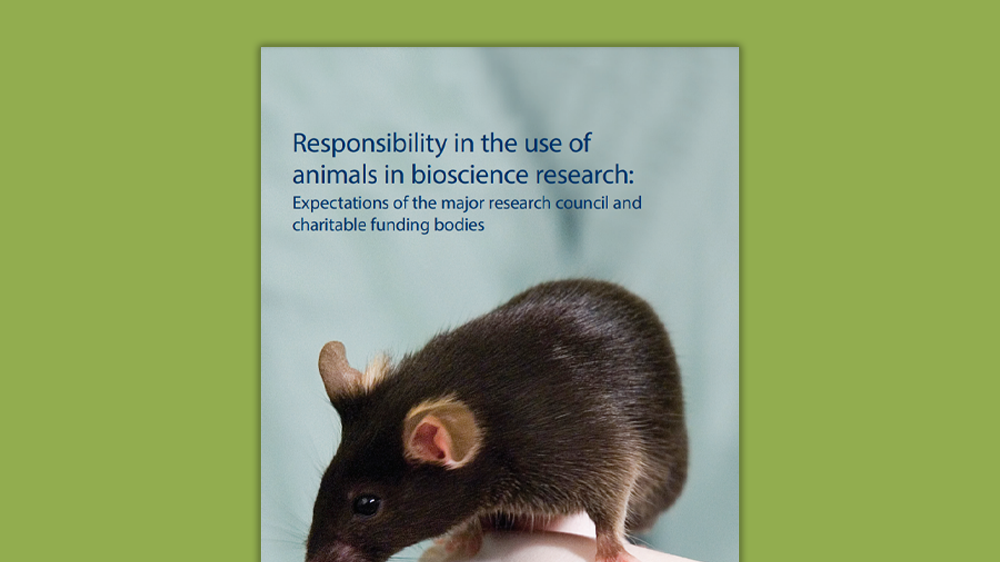绿色背景上的“在生物科学研究中使用动物的责任”的前封面。